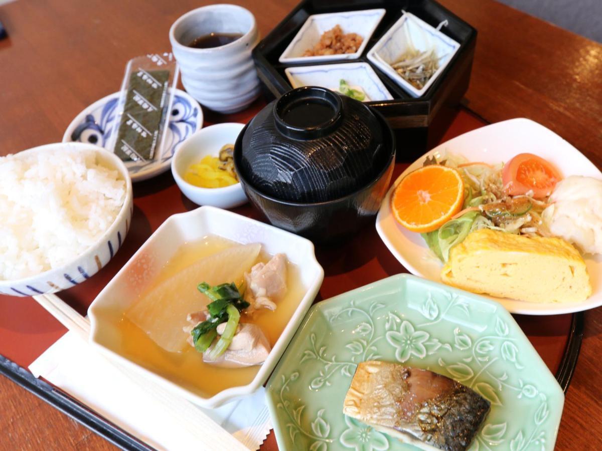 Hotel Sunrise Inn Kaizuka Buitenkant foto